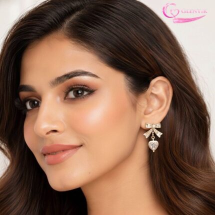 Golden Bow with Hanging Heart stud earrings. GLENTIK – Wrapped in Love ❤️.